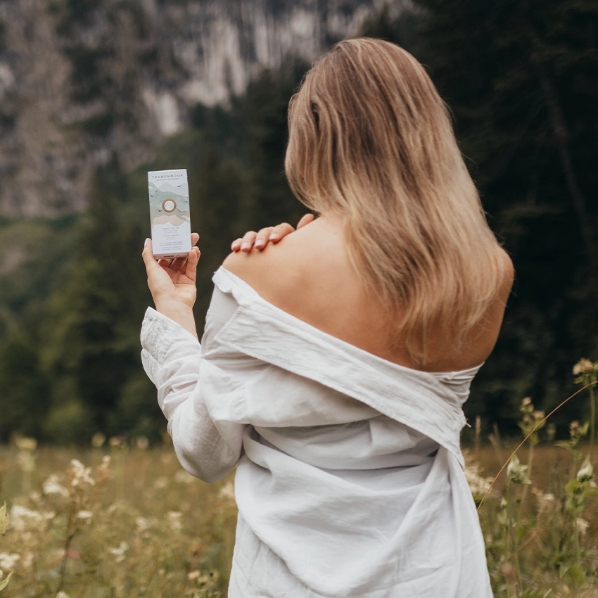 Woman holding Trawenmoor product in hand in nature